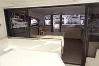 Interior view of 2017 Leopard 43 Powercat yacht with spacious seating area.