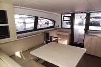 Interior of 2017 Leopard 43 Powercat with modern seating and large windows.