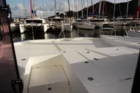 2017 Leopard 43 Powercat docked at a marina with other boats.
