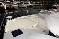 2017 Leopard 43 Powercat yacht docked in a marina with other boats.