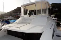 2017 Leopard 43 Powercat yacht docked at marina, rear view.