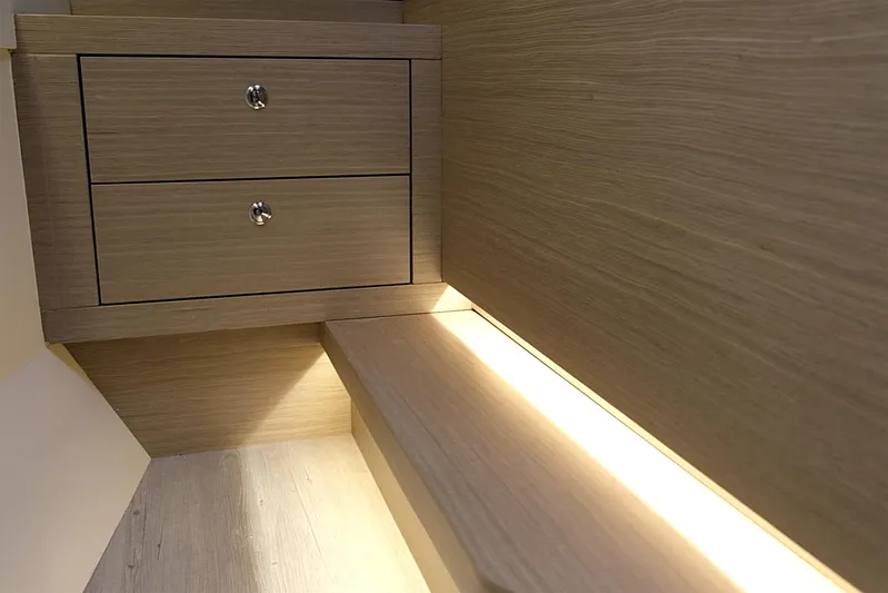  Yacht Photos Pics Modern wooden interior with drawers and ambient lighting, Custom DG CAT 43, 2023 model.