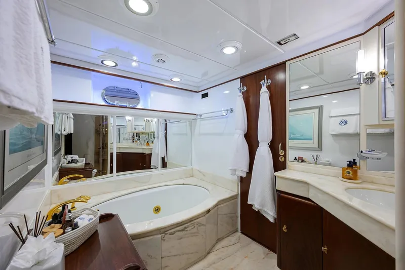 Aventurer Yacht Photos Pics Luxurious bathroom on 1986 Jongert 85 yacht with elegant fixtures and marble accents.