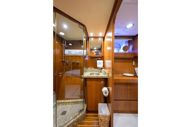 Aventurer Yacht Photos Pics Luxurious bathroom interior on 1986 Jongert 85 yacht with wood and granite finishes.