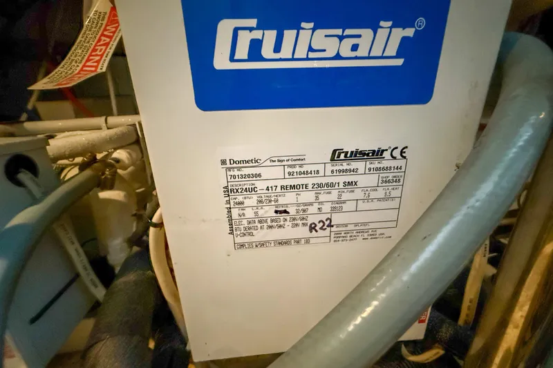 Over And Out Yacht Photos Pics Cruisair unit on a 2001 Carver 570 Voyager Pilothouse, featuring technical specifications label.