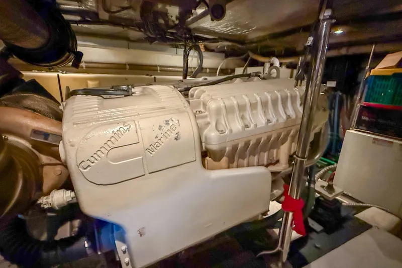 Over And Out Yacht Photos Pics Engine room of 2001 Carver 570 Voyager Pilothouse with Cummins Marine engine.
