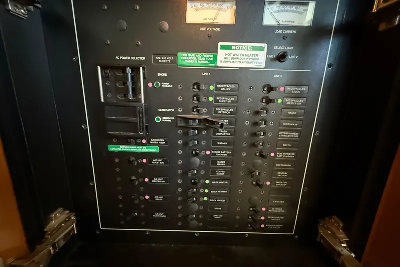 Over And Out Yacht Photos Pics Electrical control panel of a 2001 Carver 570 Voyager Pilothouse yacht.