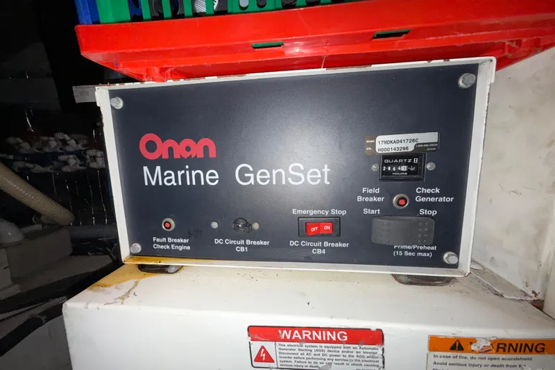Over And Out Yacht Photos Pics Onan Marine GenSet control panel on 2001 Carver 570 Voyager Pilothouse.