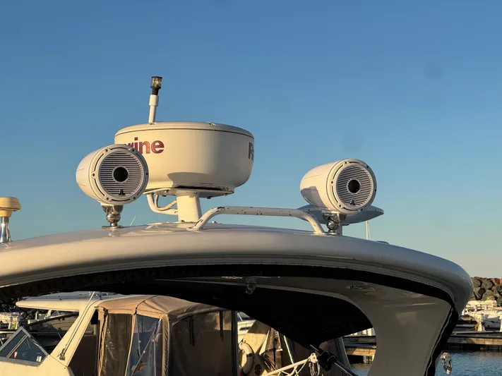 Pura Vida Yacht Photos Pics Sea Ray 330 Sundancer 2011 with radar equipment at the marina.