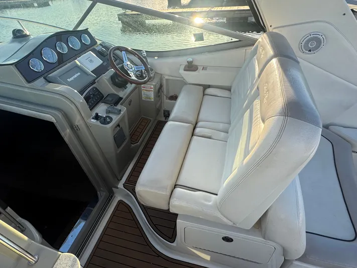 Pura Vida Yacht Photos Pics Interior of 2011 Sea Ray 330 Sundancer with helm console.