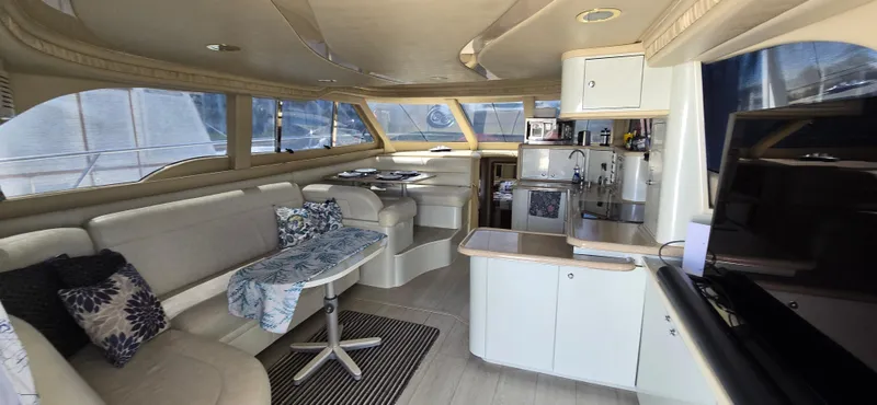 Saga Yacht Photos Pics Luxurious interior of a 1999 Sea Ray 480 Sedan Bridge yacht with modern amenities.