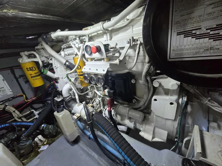 Saga Yacht Photos Pics Engine room of a 1999 Sea Ray 480 Sedan Bridge with visible components and wiring.