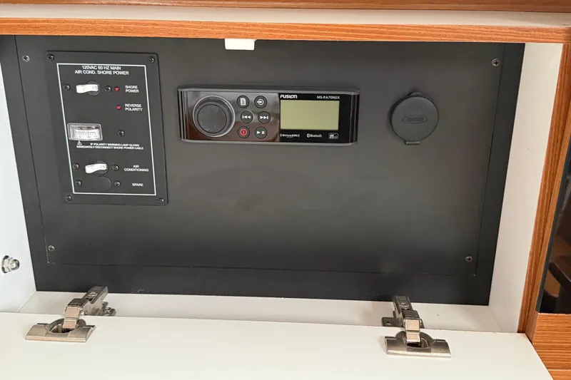  Yacht Photos Pics 2023 Catalina 315 control panel with air conditioning and audio system.