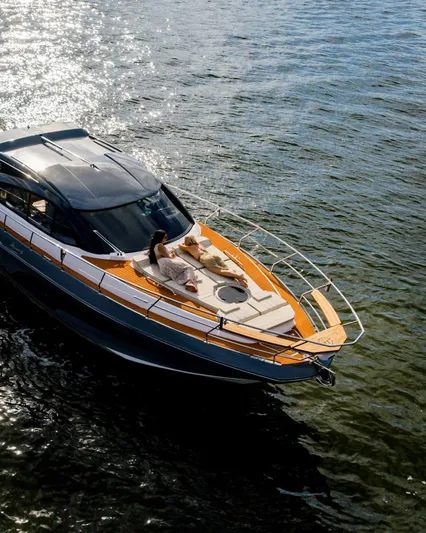 Custom Order Your 415 Today! Yacht Photos Pics Luxury Hanover 415 yacht cruising on sparkling water, 2025 model.