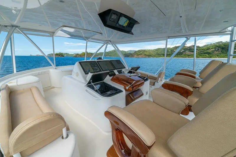 Watts Up Yacht Photos Pics Luxurious interior of 2016 Viking 66 Convertible yacht with ocean view.