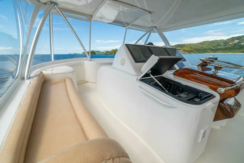 Watts Up Yacht Photos Pics Luxurious interior of 2016 Viking 66 Convertible yacht with ocean view.