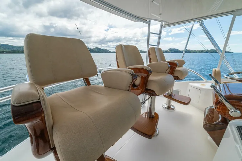 Watts Up Yacht Photos Pics Luxurious seating on 2016 Viking 66 Convertible yacht with ocean view.