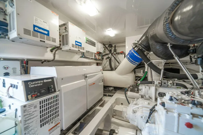 Watts Up Yacht Photos Pics Engine room of 2016 Viking 66 Convertible yacht with Cummins Onan generator.