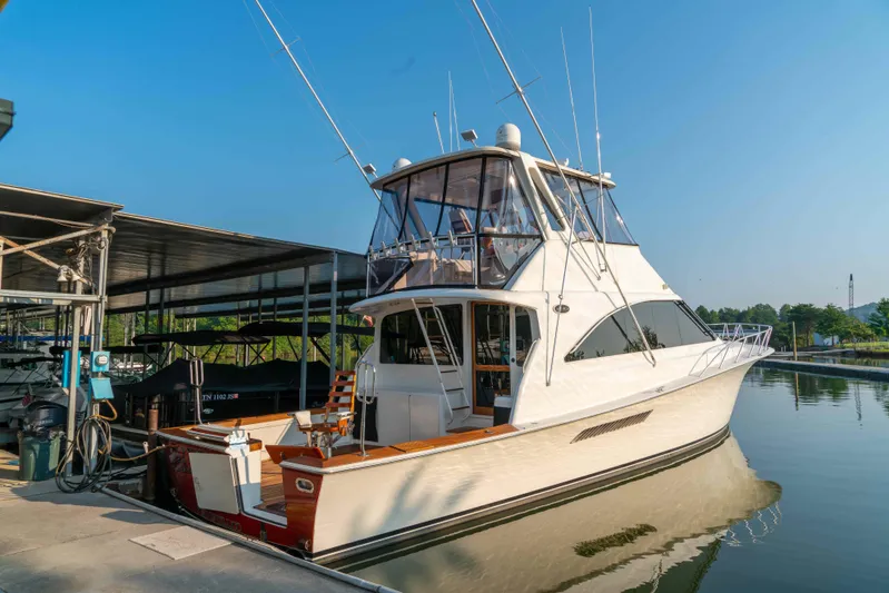  Yacht Photos Pics 1997 Ocean Yachts 60 Sport Fish docked at marina under clear blue sky.