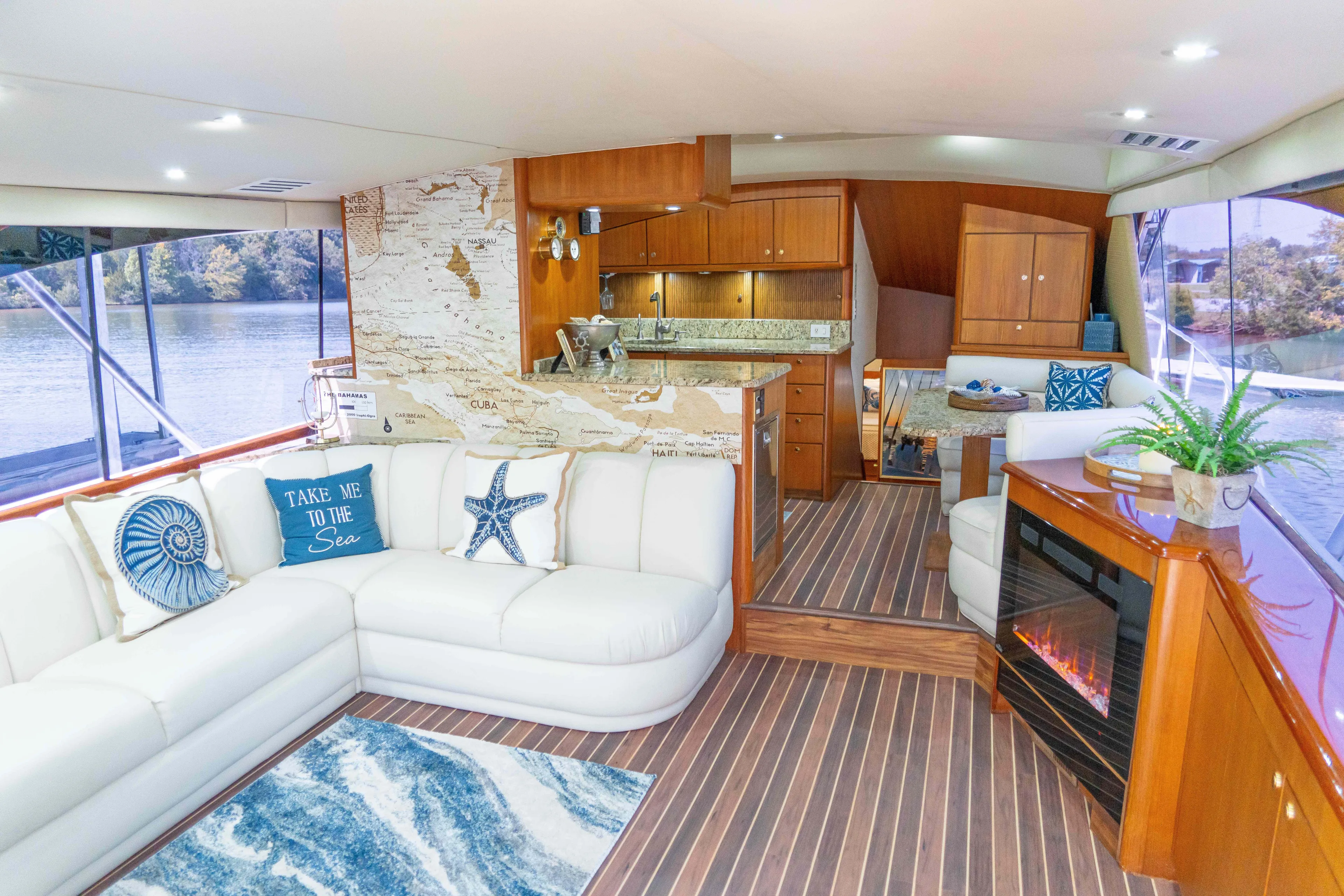  Yacht Photos Pics Luxurious 1997 Ocean Yachts 60 Sport Fish interior with elegant seating and modern amenities.