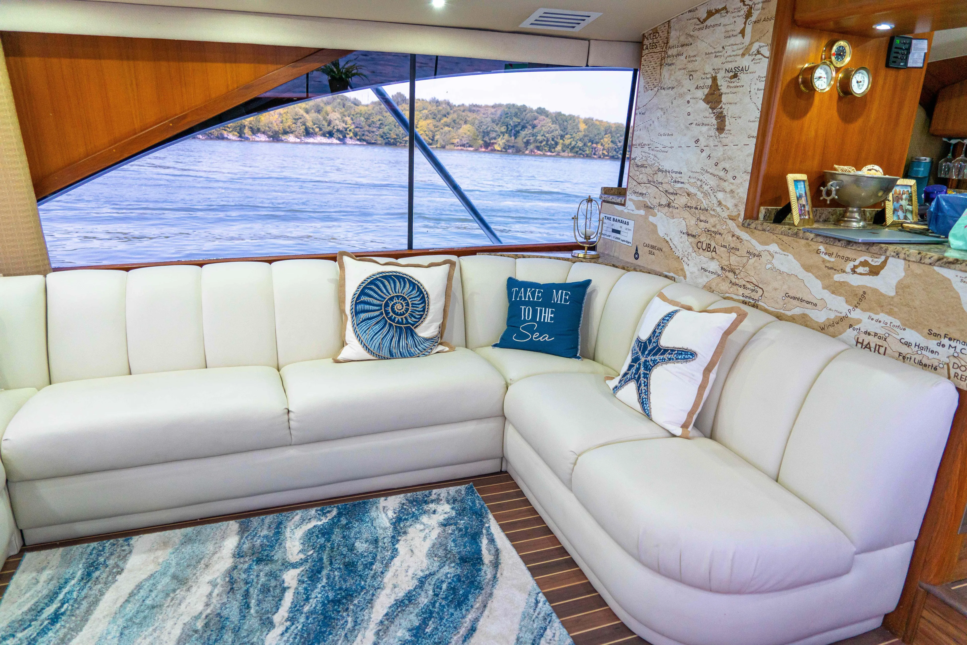  Yacht Photos Pics Luxurious interior of 1997 Ocean Yachts 60 Sport Fish with nautical-themed decor.