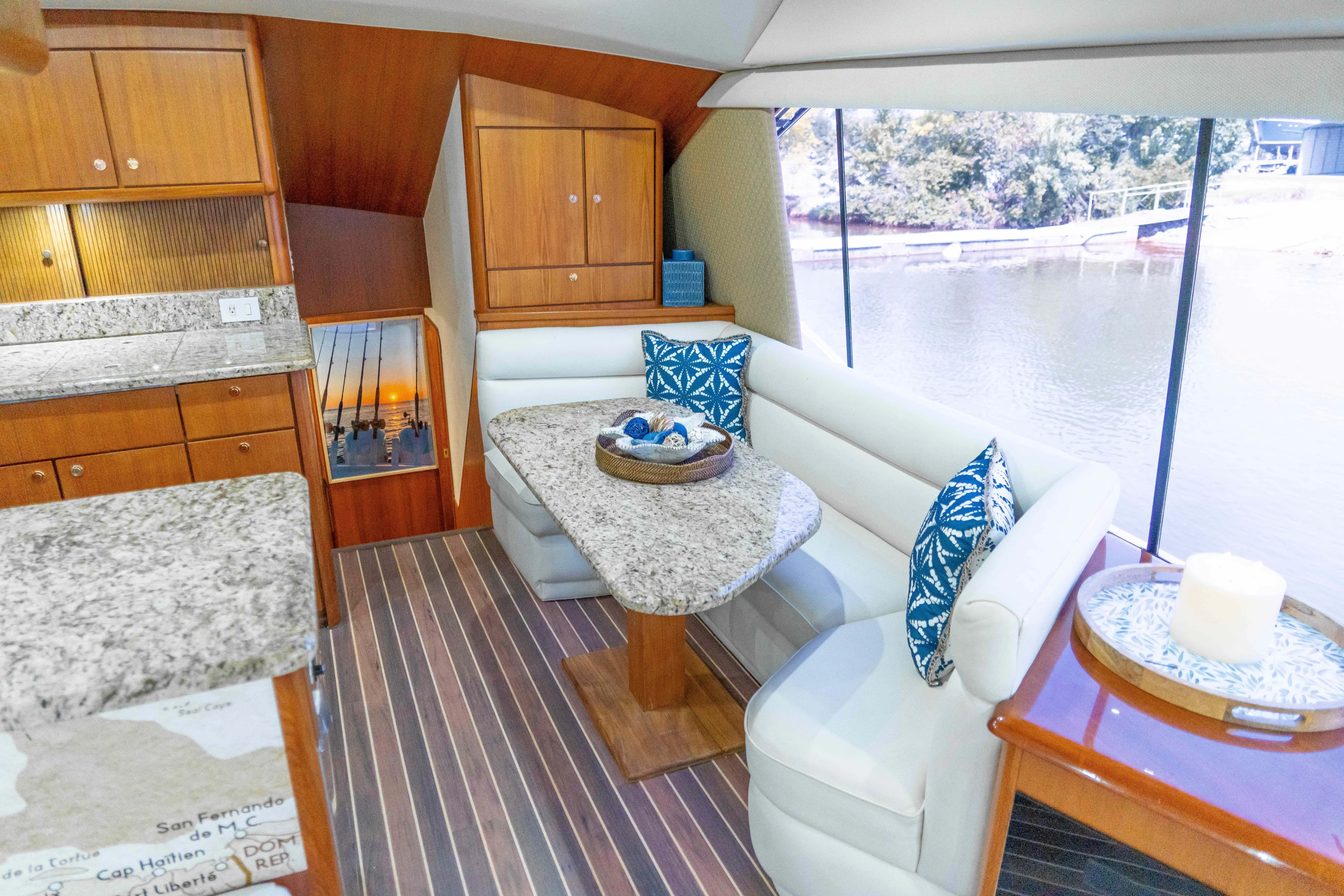  Yacht Photos Pics Interior of 1997 Ocean Yachts 60 Sport Fish with elegant dining area and waterfront view.