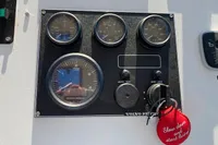 Control panel of a 1997 Custom Survey 55 boat with Volvo Penta gauges.