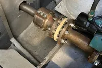 Close-up of mechanical components in a Custom Survey 55, 1997 model.