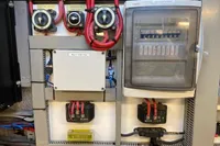 Electrical control panel with switches, wires, and circuit breakers, Custom Survey 55, 1997 model.