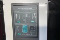 Whisper Power Charger Control panel on Custom Survey 55, 1997 model.