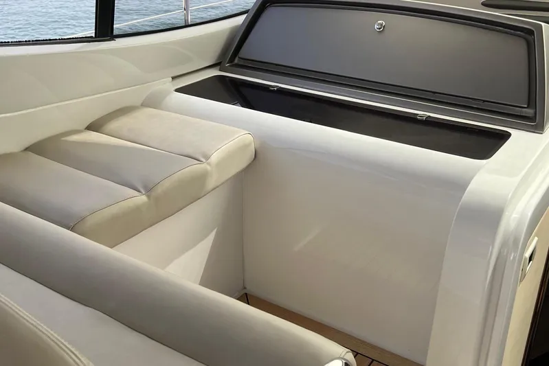  Yacht Photos Pics Interior seating of 2010 Pershing 56 yacht with sleek design and comfortable cushions.