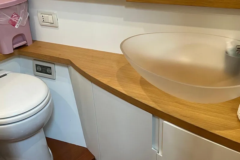  Yacht Photos Pics Luxury yacht bathroom with modern sink and toilet, Pershing 56, 2010 model.