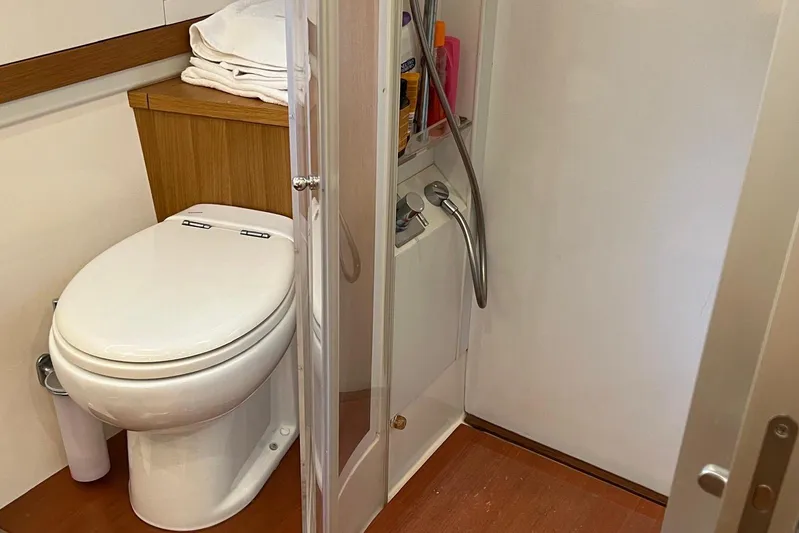  Yacht Photos Pics Bathroom interior of 2010 Pershing 56 yacht with toilet and shower.