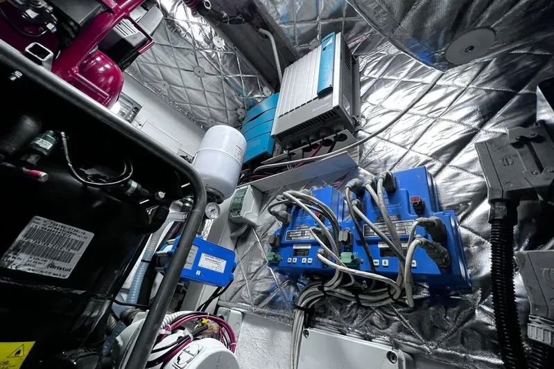  Yacht Photos Pics Engine room of a 2010 Pershing 56 yacht with complex wiring and equipment.