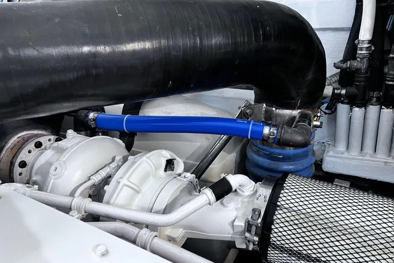  Yacht Photos Pics Engine components of a 2010 Pershing 56 yacht, featuring hoses and filters.