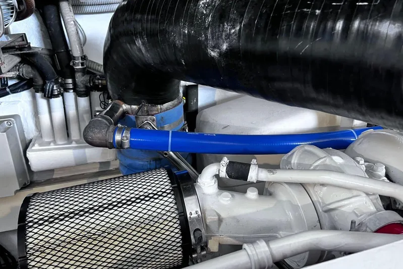  Yacht Photos Pics Engine components of a 2010 Pershing 56 yacht, featuring hoses and filters.