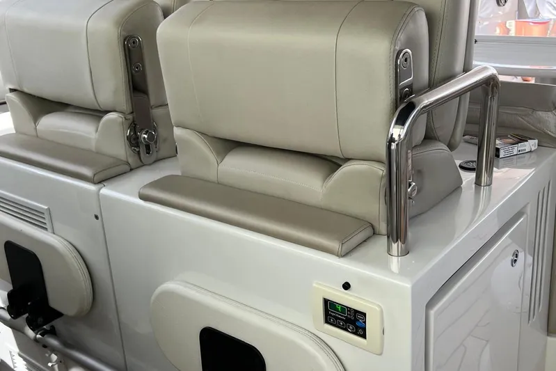  Yacht Photos Pics Luxurious seating on a 2010 Pershing 56 yacht with modern controls and sleek design.