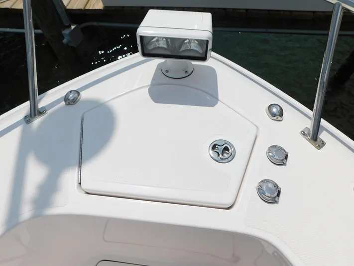 Happily Ever After Yacht Photos Pics Bow of 2016 Belzona 327 WA boat with hatch and spotlight.