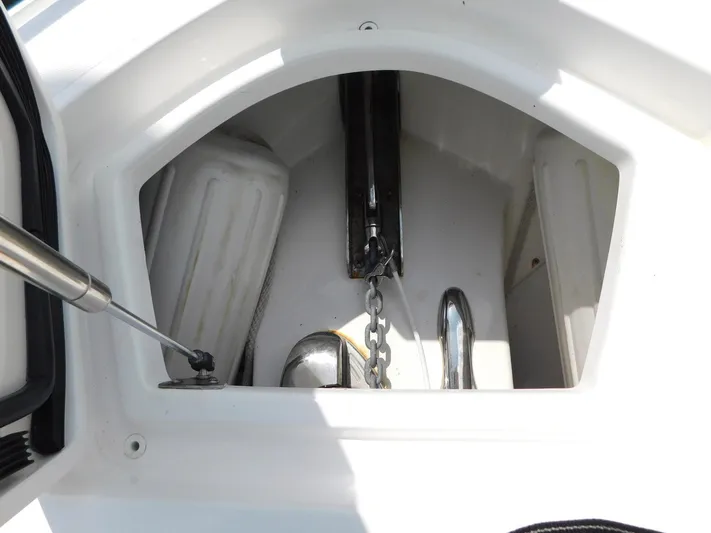 Happily Ever After Yacht Photos Pics Anchor compartment of 2016 Belzona 327 WA boat with chain and fenders.