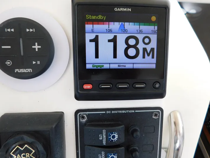 Happily Ever After Yacht Photos Pics Garmin marine display on Belzona 327 WA, showing heading and controls, 2016 model.