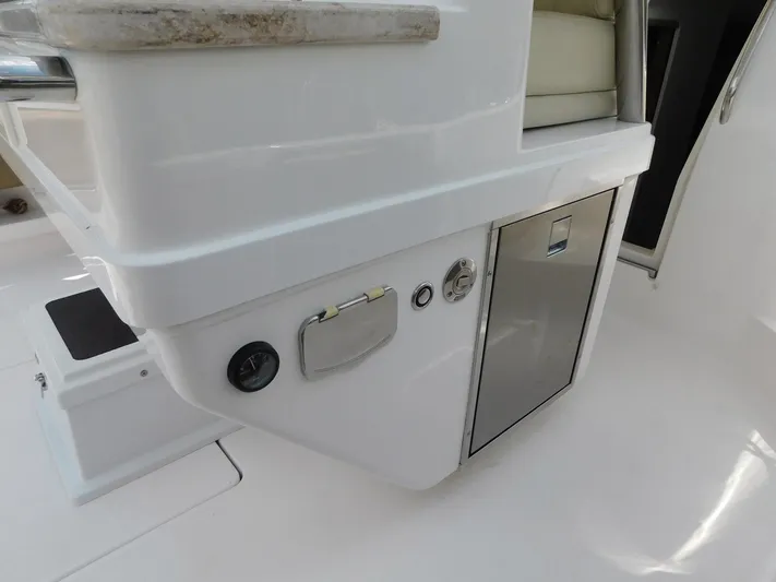 Happily Ever After Yacht Photos Pics Interior view of a 2016 Belzona 327 WA boat, featuring sleek cabinetry and seating.