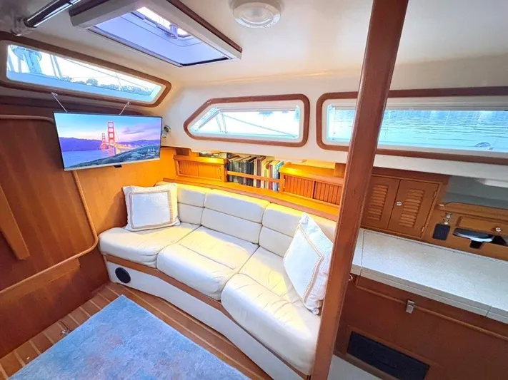 Calliope Yacht Photos Pics Luxurious interior of 2007 Island Packet 485 yacht with cozy seating and modern amenities.
