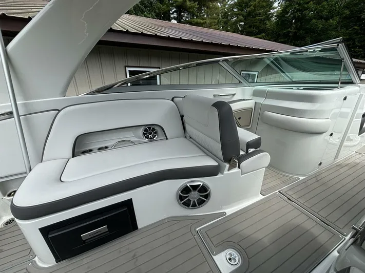  Yacht Photos Pics 2021 Crownline E305XS boat interior with sleek seating and modern design.