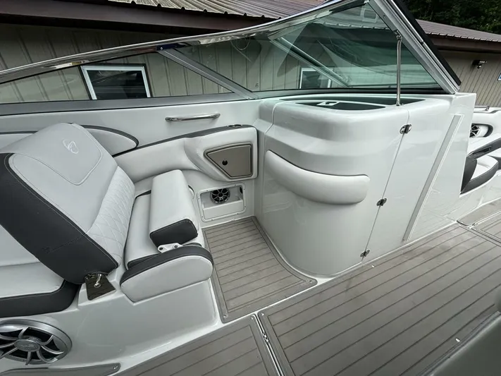  Yacht Photos Pics 2021 Crownline E305XS boat interior with sleek seating and modern design.