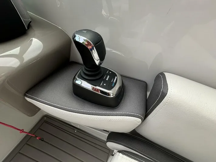  Yacht Photos Pics Joystick control on 2021 Crownline E305XS boat, featuring sleek design and modern technology.