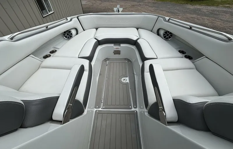  Yacht Photos Pics 2021 Crownline E305XS boat interior with spacious seating and modern design.