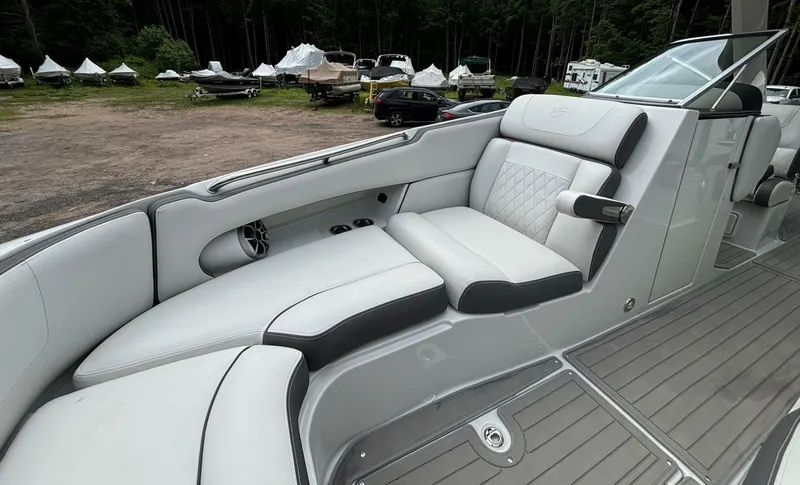  Yacht Photos Pics 2021 Crownline E305XS boat interior with luxurious seating and modern design.