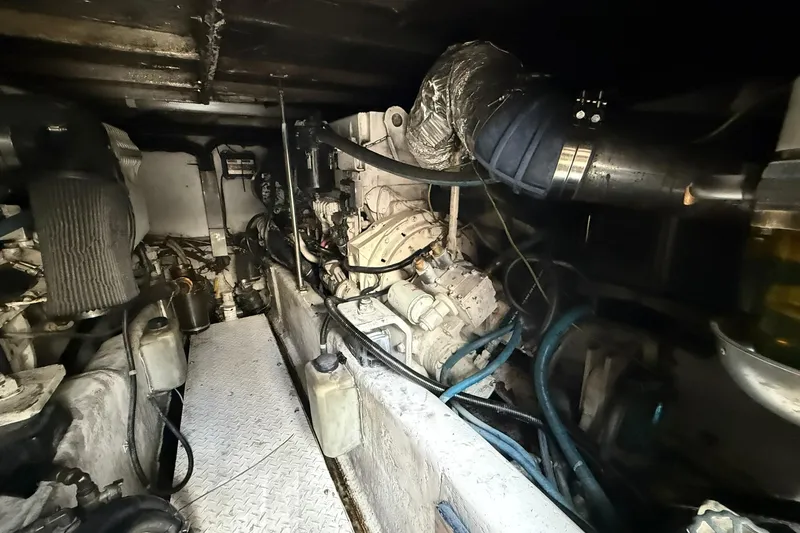  Yacht Photos Pics Engine room of 2005 Sea Ray 500 Sedan Bridge with visible machinery and components.