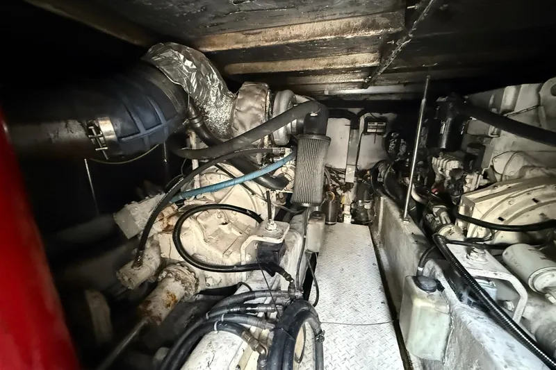  Yacht Photos Pics Engine room of a 2005 Sea Ray 500 Sedan Bridge yacht, showcasing mechanical components.