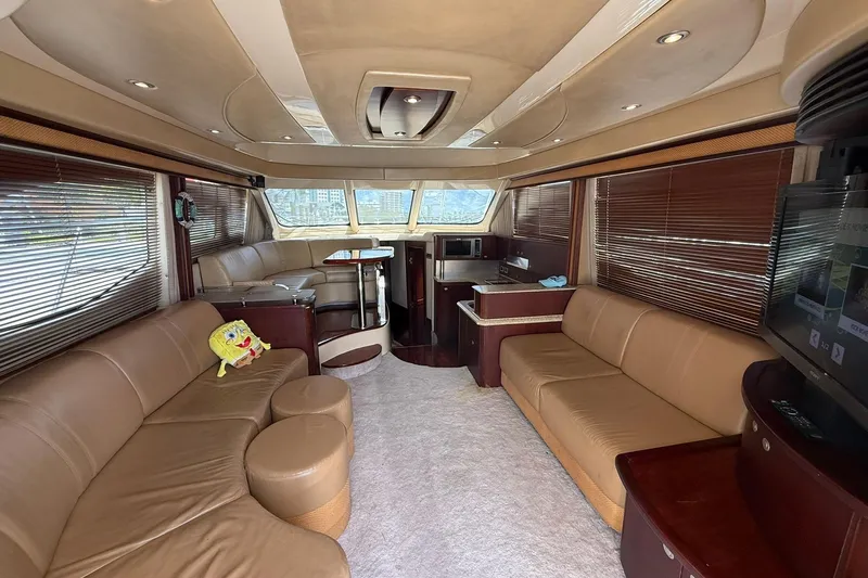  Yacht Photos Pics Luxurious interior of a 2005 Sea Ray 500 Sedan Bridge yacht with plush seating.